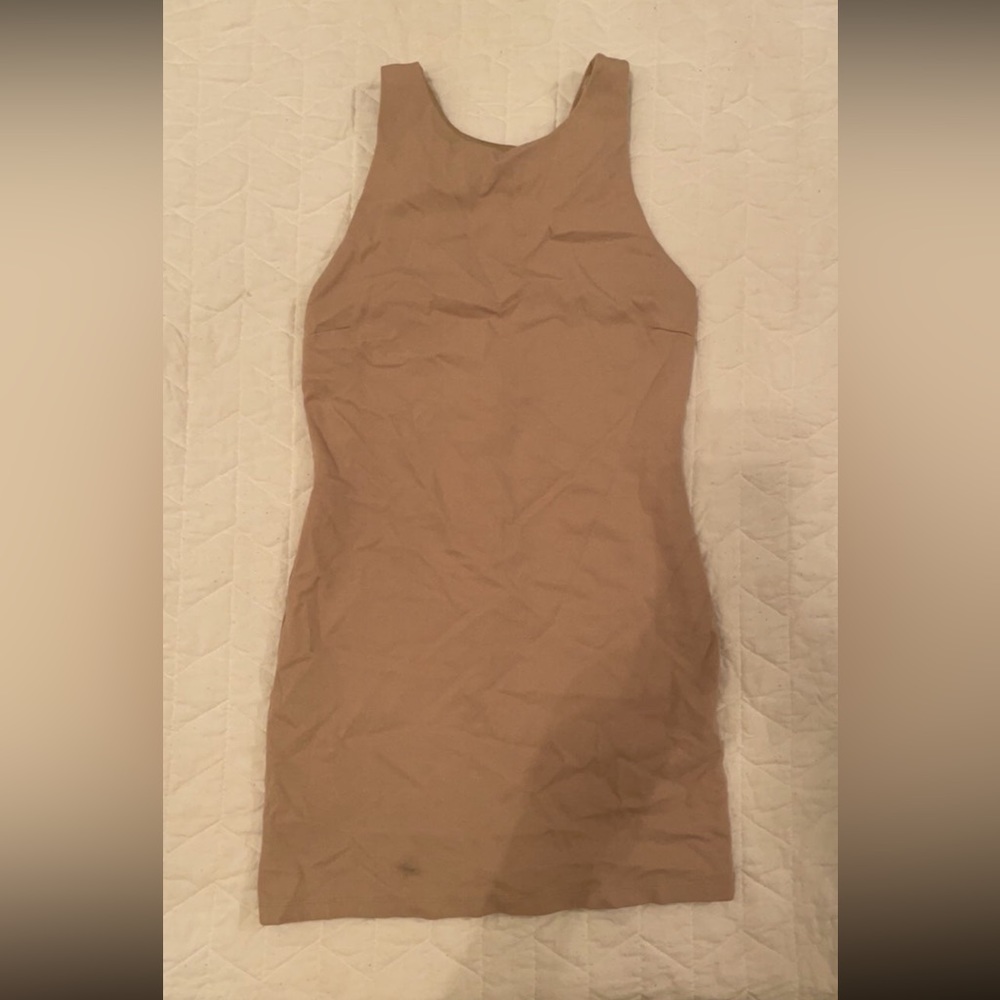 Mini dress. Nude/beige color.